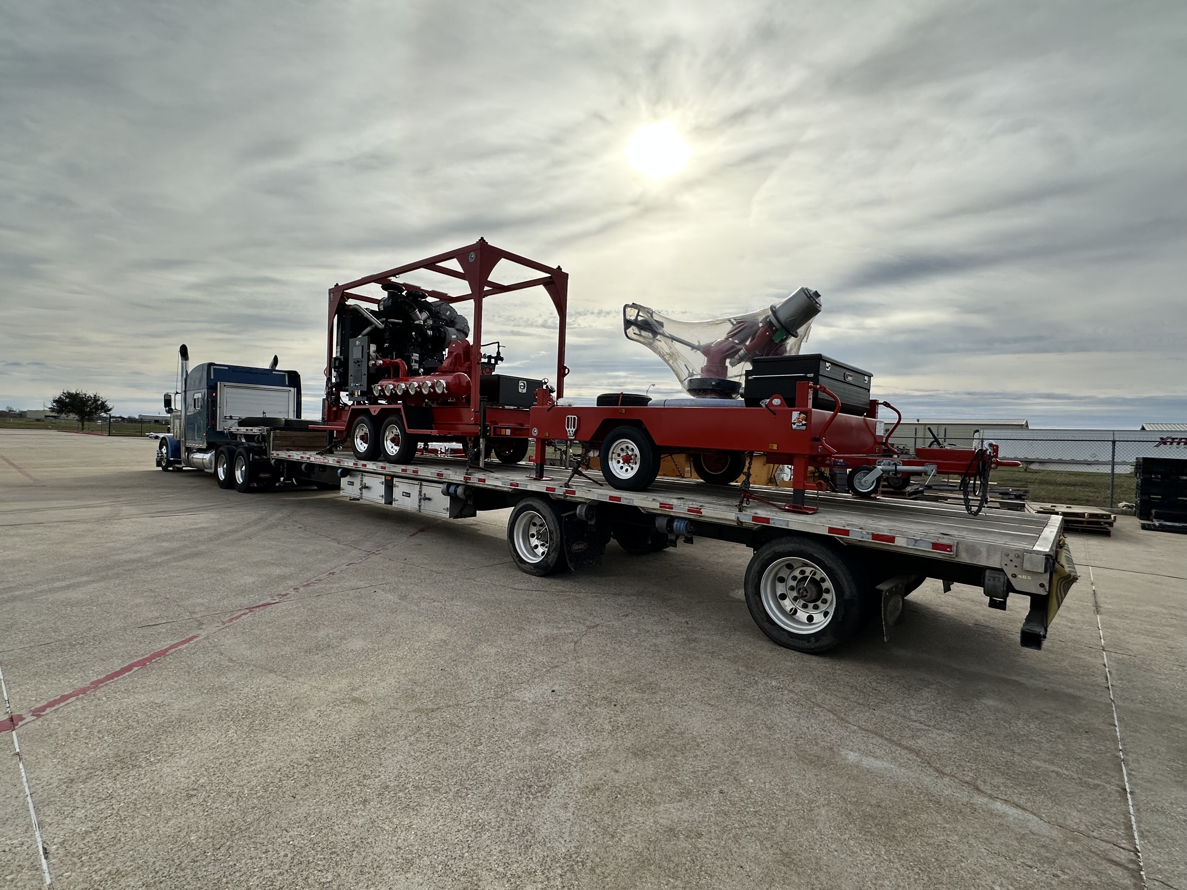 Vehicles being inspected before international shipping