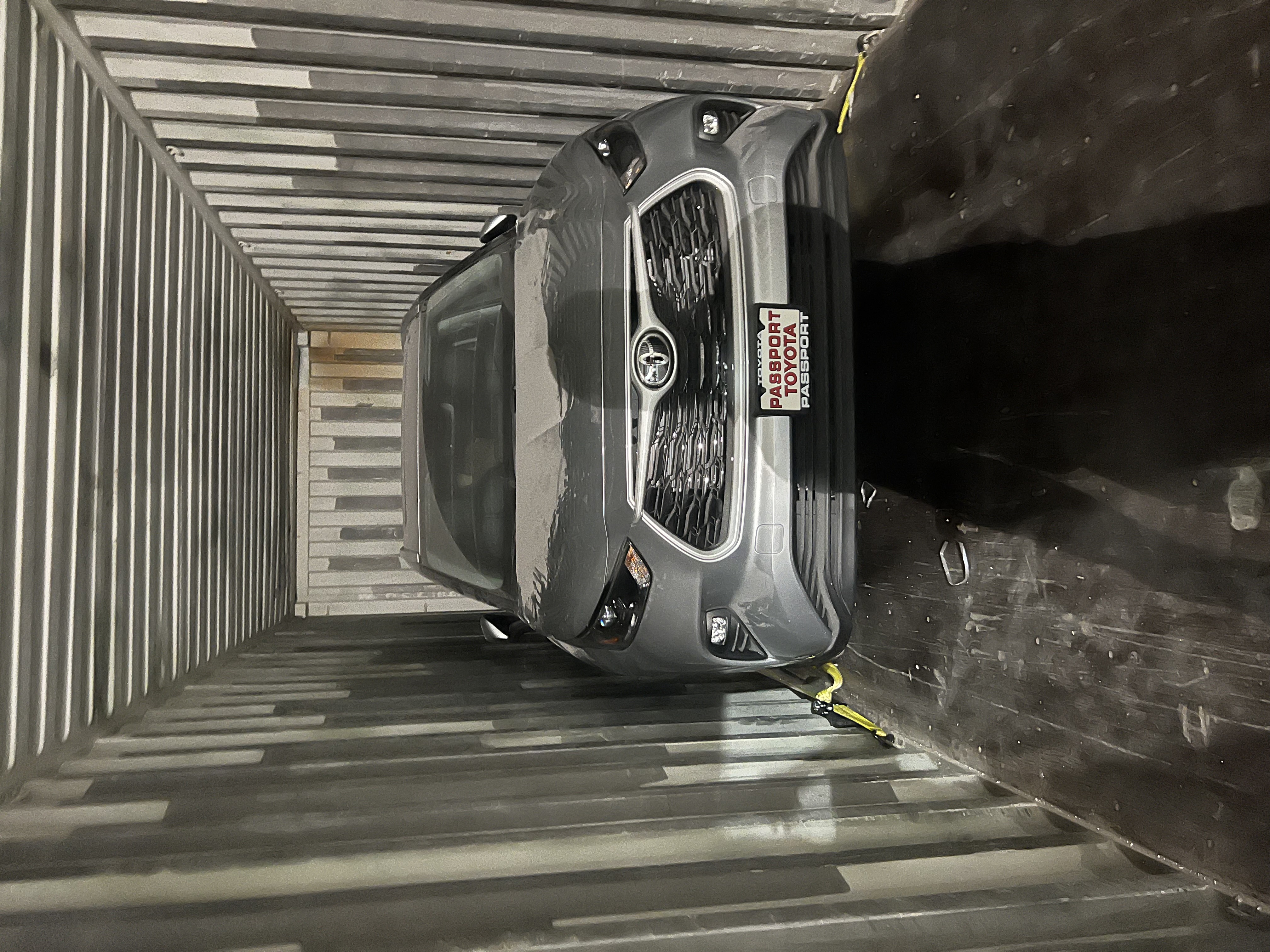 RoRo shipping operation with vehicles on vessel ramp